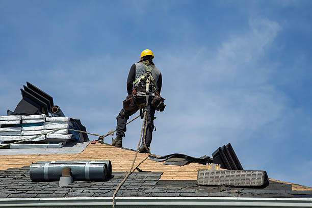 Professional Roofing technician working in Stoneham, MA
